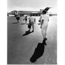 Passengers boarding an Ansett 727 aircraft for a flight to Brisbane. Townsville airport, 30/9/89