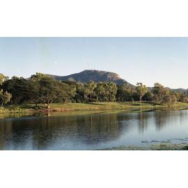 Early morning view of Mount Stuart and Ross River, photographed downstream from Charles Barton Bridge, Townsville, 1991