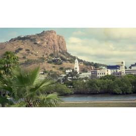 View over Ross Creek to the city and Castle Hill, Townsville, 1991