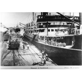 Loading a shipment of sandalwood, Jetty wharf, Townsville, 1929. 