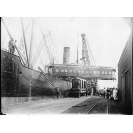 Railway carriage being unloaded at Jetty wharf, Townsville harbour, 1913 