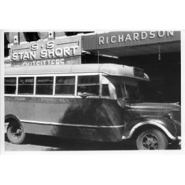 Hermit Park and Rising Sun bus, Flinders Street, Townsville, 1943
