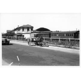 Horse and cart on Flinders Street West, Townsville, 1943