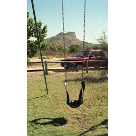 Children's swing made from recycled tyres in a South Townsville playground, 1991