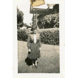 Young woman posing for a photograph in a Girl Guides uniform