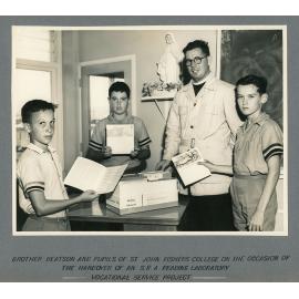 Brother Beatson and pupils of St. John Fishers College on the occasion of the handover of an S.R.A. Reading Laboratory, Vocational Service Project