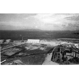 Rock phosphate storage and drying area, oil tanks and the South Townsville power house, aerial view, 1977