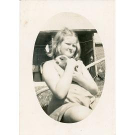 Family photograph from the Quelch Forno collection : Girl with guinea pig