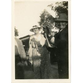 Family photograph from the Quelch Forno collection : Older man and woman with a joey
