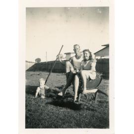 Family photograph from the Quelch Forno collection : Beryl Forno, a man and child in a backyard