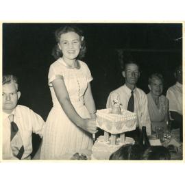Family photograph from the Quelch Forno collection : Beryl Forno cutting her 21st birthday cake