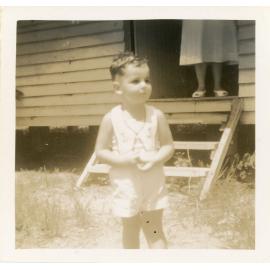 Neil Ballment posing for a photo, Magnetic Island, Townsville, [1950s]