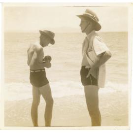 Family photograph from the Quelch Forno collection : Two men on a beach
