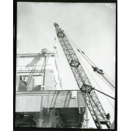 Demolition of the Queensland Ambulance Transport Brigade building, corner of Sturt and Stanley Streets, Townsville City, Townsville, 15 September 1968