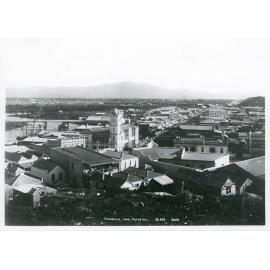 View of Flinders Street, including the Post Office, Victoria Bridge, Fire Brigade hose drying tower and the Town Hall, Townsville, circa 1890