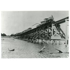 Train crossing the Inkerman Bridge, Burdekin River, 1913