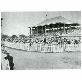 Crowd watching the finish of the Cleveland Bay Handicap at Cluden Rcecourse, Townsville, July 1951
