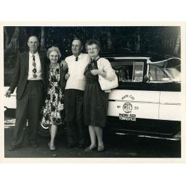 Taxi no. 33, Townsville White Cab and a group of four people