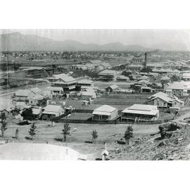 Flinders Street West, Townsville, showing the Lion Brewery, the Family and Railway Hotels, Townsville City, ca 1910s