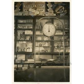 Interior of Philip Leong's first shop, featuring the Universal scales on the counter top, Townsville, 1940's