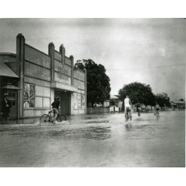 Flooding near the Estate Theatre, Railway Avenue, Railway Estate, Townsville, after the 1940 cyclone