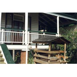 Unidentified location, house verandah: 1996-1997 residential grants / Townsville City Council