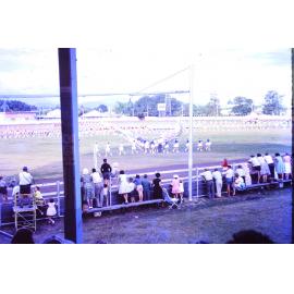 Mass display of marching teams, Townsville showgrounds, 1962