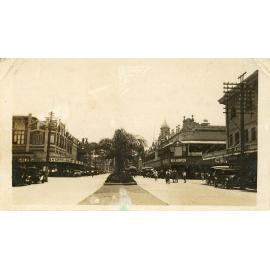 View of Flinders Street showing McKimmins & Richardson's store and Hawton's Central Hotel, Townsville, ca.1930