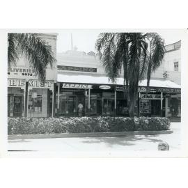 Shops in central Flinders Street, Townsville City, Townsville, 1965