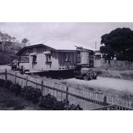 House relocation, corner of Bundock and Howitt Streets, North Ward, Townsville, 1946
