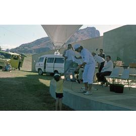 4TO radio station personality Steve Price on stage at the Soundshell, South Townsville, 1985