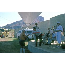 4TO radio station personality Steve Price on stage at the Soundshell, South Townsville, 1985