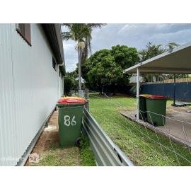 Garbage bins tied up ahead of Cyclone Kirrily