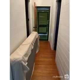 Mattress in hallway ahead of Cyclone Kirrily