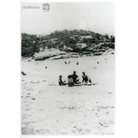 Group of people on the beach at Alma Bay, Magnetic Island
