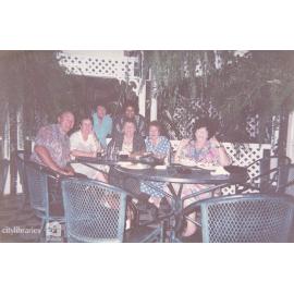 Jean Cole and staff of Carramar Children's Home at a restaurant, Townsville, ca. 1990
