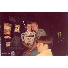 Staff of Carramar Children's Home in a gaming room, Townsville, ca. 1990