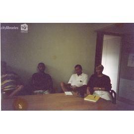 Staff at a table, Carramar Children's Home, Townsville, ca. 1990