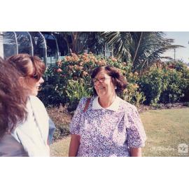 Staff member of Therapeutic Adolescent Residential Assessment Unit (TARA) outside of restaurant, Townsville, ca. 1995