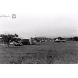 Boats left high and dry in Hanran Park after tidal surge, Townsville, 25th December, 1971