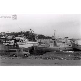 Boats piled up at the swing basin following Cyclone Althea, Palmer Street, South Townsville, 25th December, 1971