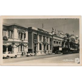 Commonwealth Bank of Australia and City Buildings decorated for Queen Elizabeth II visit, Flinders Street, Townsville 1954