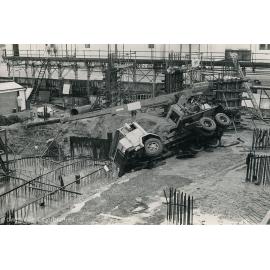 Overturned crane, Hotel Townsville, Townsville, 1974