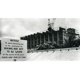 Sign on construction at The Strand, Townsville, 1969