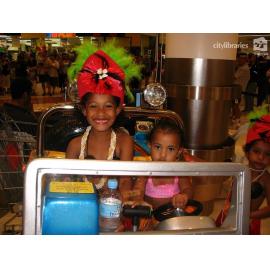 Children on an amusement ride at Castletown Shopping Centre, Townsville, August 2007