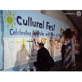 Community members painting the stage backdrop at Cultural Fest, Strand Park, Townsville, August 2007