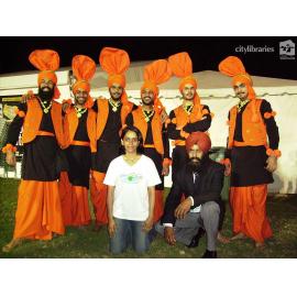 Indian Bollywood performers with staff at Cultural Fest, Strand Park, Townsville, August 2007