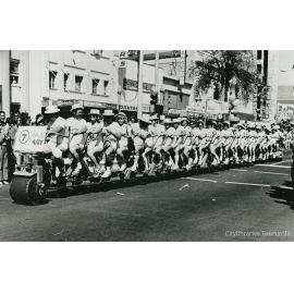 Fun cyclists in the Pacific Festival parade, Flinders Street, Townsville, 1979