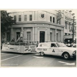 Queensland Road Safety Council's entry in the Centenary Parade, corner of Flinders and Denham Street, Townsville, 7 November 1964