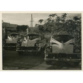 Three decorated taxis, St Matthew's Anglican Church, Townsville